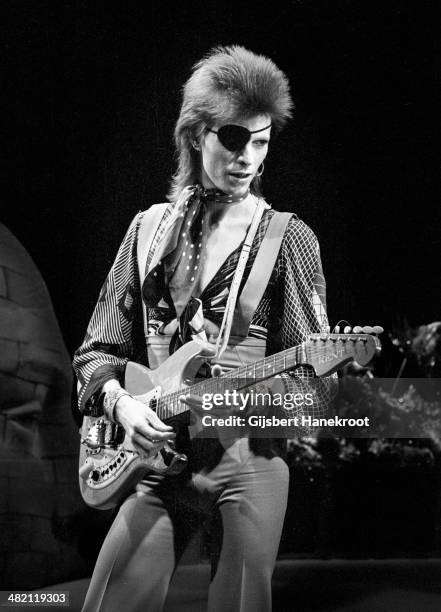 David Bowie, with eye patch, performs Rebel Rebel in the Top Pop Studios, Hilversum, Netherlands on February 13 1974.