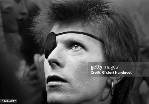 David Bowie, wearing an eye patch, conducts a press conference at the Amstel Hotel, Amsterdam, Netherlands on February 13 1974.