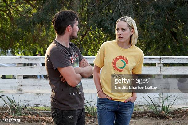 The Hunger Games co-stars Josh Hutcherson and Jena Malone on set for "The Rusted," a short film for Canon's Project Imagination: The Trailer on July...