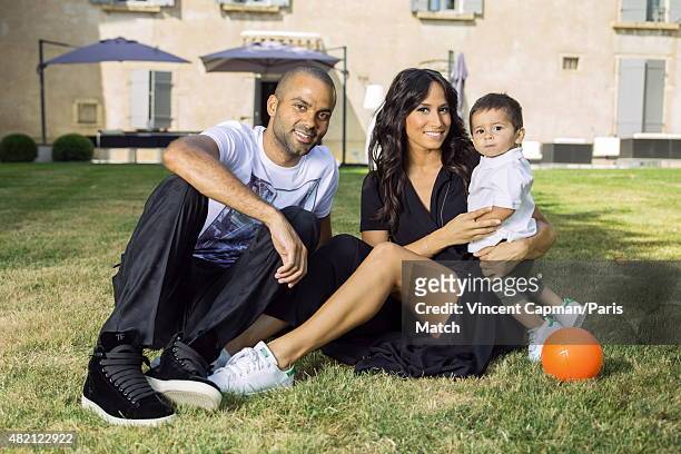 Tony Parker with his wife Axelle Francine and their son Josh are photographed for Paris Match in their new property on july 15, 2015 in near...
