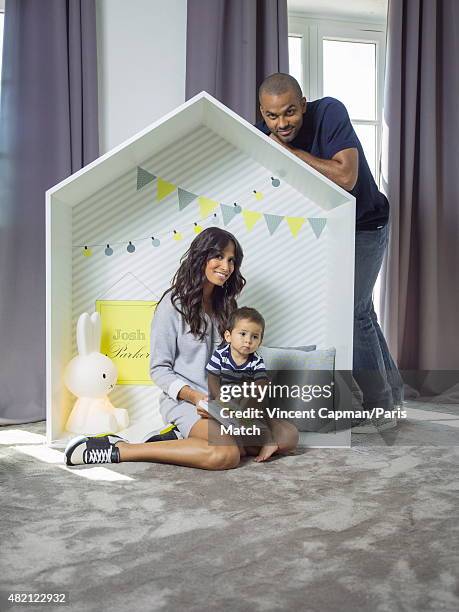 Tony Parker with his wife Axelle Francine and their son Josh are photographed for Paris Match in their new property on july 15, 2015 in near...