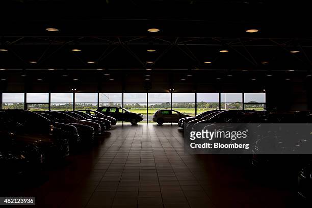 Automobiles sit inside a LeasePlan Corp. Used car leasing and contract hire showroom in Breukelen, Netherlands, on Monday, July 27, 2015. Volkswagen...