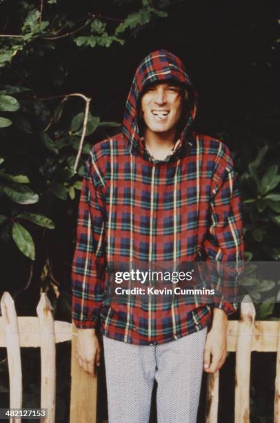 Singer-songwriter and guitarist Evan Dando, of American band The Lemonheads, wearing a tartan hoodie, circa 1996.