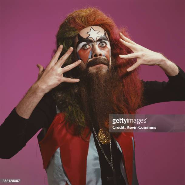 Irish comedian Sean Hughes wearing a wig, false beard and face paint in imitation of musician Roy Wood of British pop group Wizzard, circa 1995.