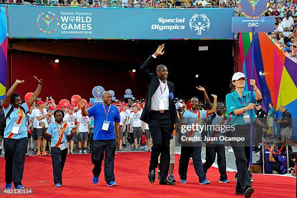 Former NBA player, Dikembe Mutombo walks out during the Special Olympics World Games Opening Ceremonies at the Los Angeles Memorial Coliseum on July...