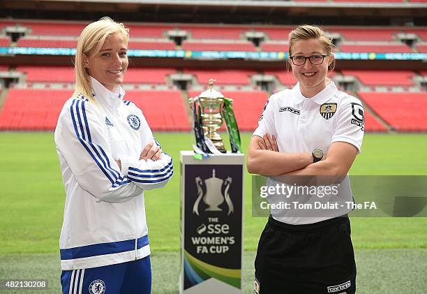 Katie Chapman of Chelsea Ladies FC and Ellen White of Notts County Ladies FC pose for photographs with the trophy during the SSE Women's Cup Final...