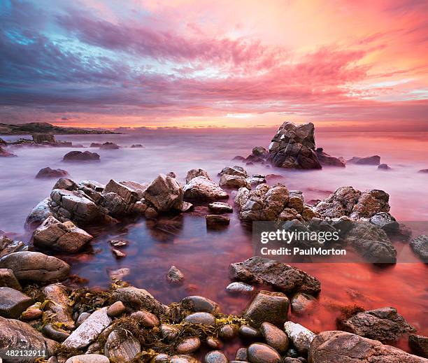 sunset on rocky western australian coastline - margaret river australia stock pictures, royalty-free photos & images