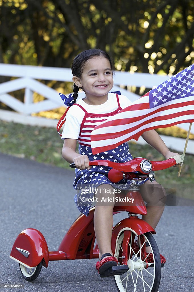 Mixed race girl wearing American flag colors