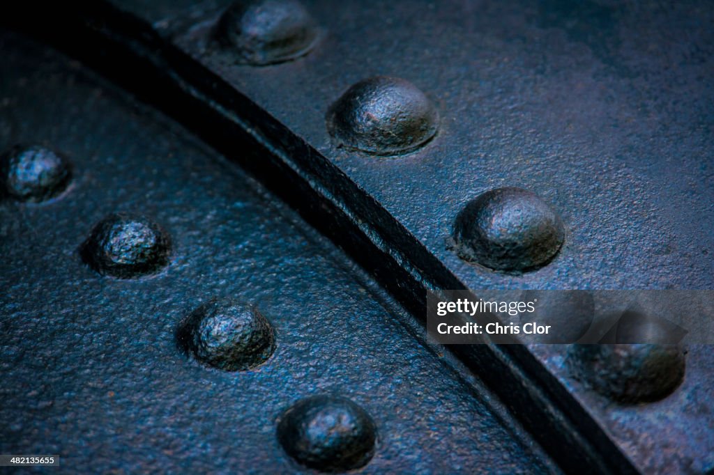 Close up of rivets on sheet metal