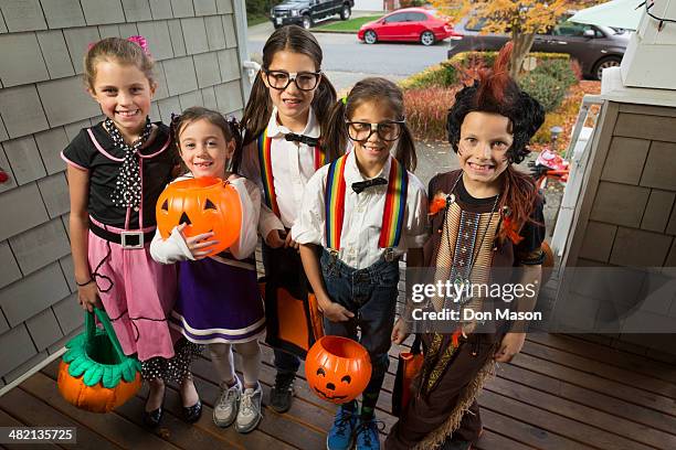 children trick-or-treating for halloween - poodle skirt stock pictures, royalty-free photos & images