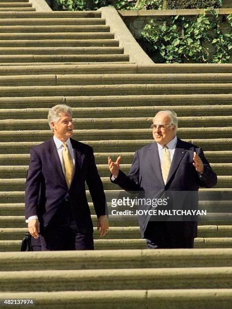 Chancellor of the Federal Republic of Germany Helmut Kohl escorts US President Clinton after their joint press conference at San Souci Park 13 May in...