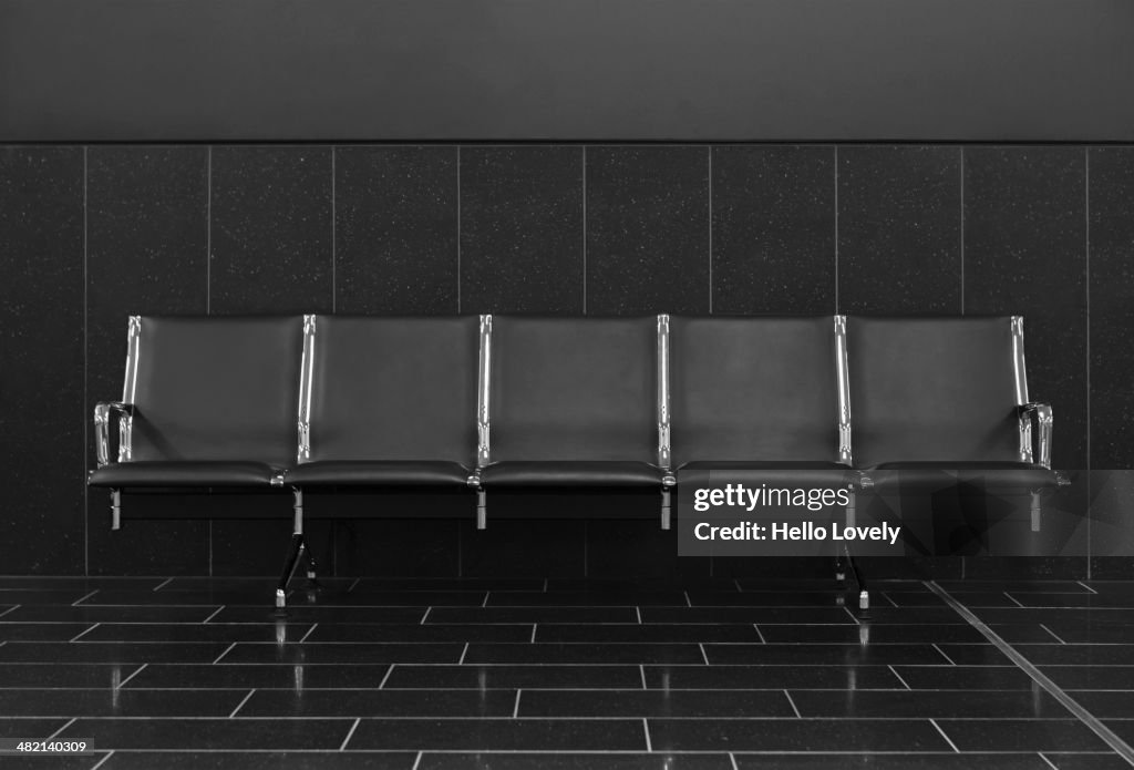 Empty seats in airport lobby