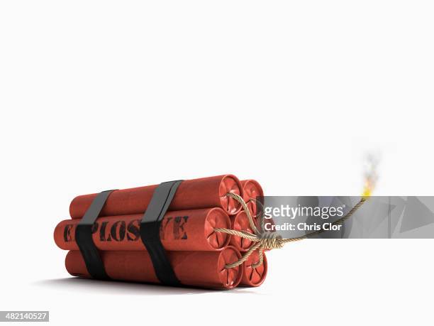 lit bundle of dynamite - explosive stock pictures, royalty-free photos & images
