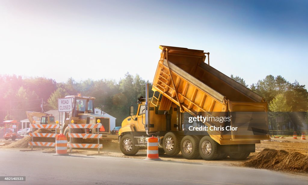 Dump truck dumping haul on site