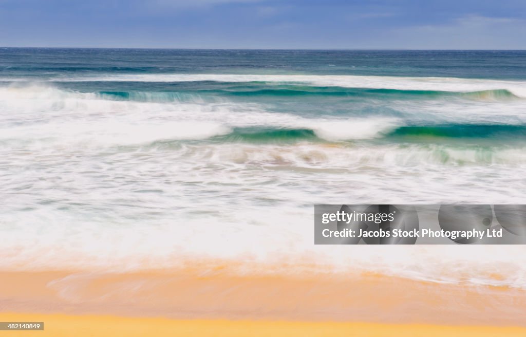 Waves crashing on beach