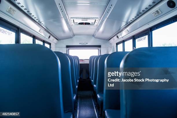 empty seats on school bus - seat stock pictures, royalty-free photos & images