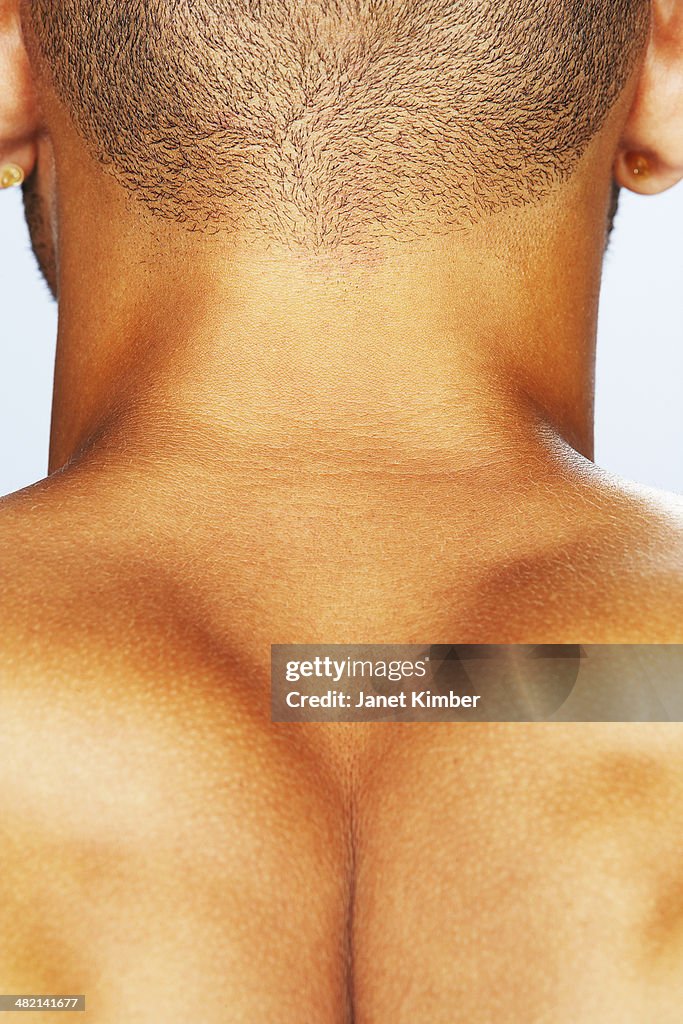 Close up of mixed race man's neck