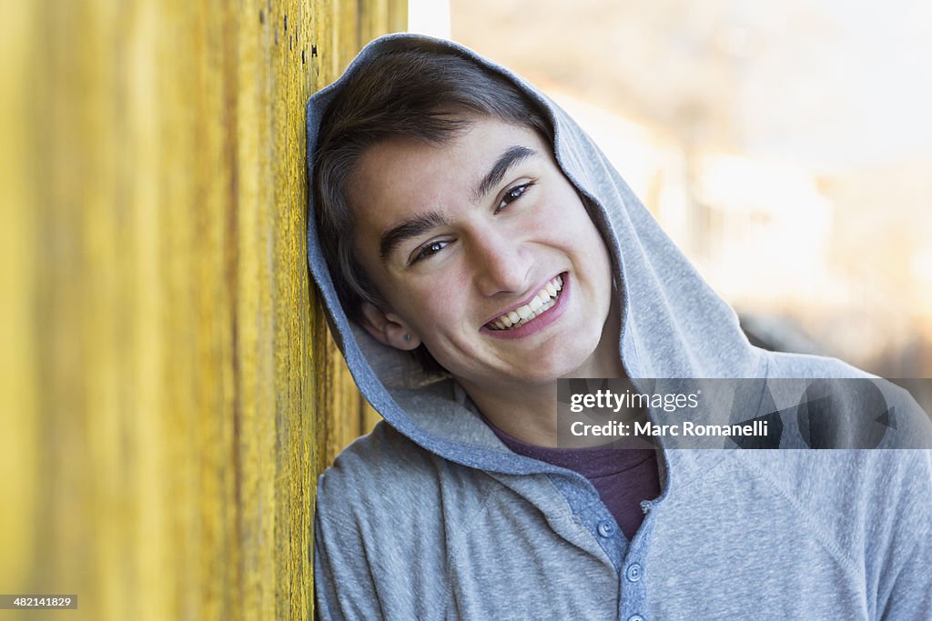 Mixed race teenage boy smiling