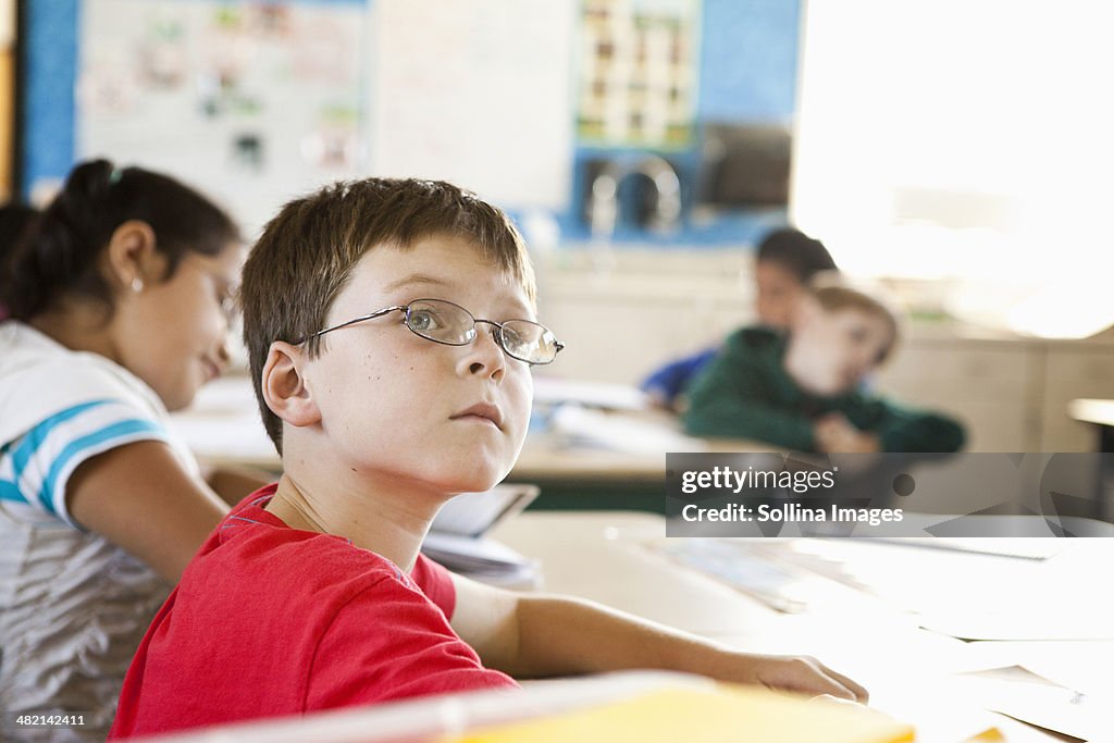 Caucasian student sitting in class