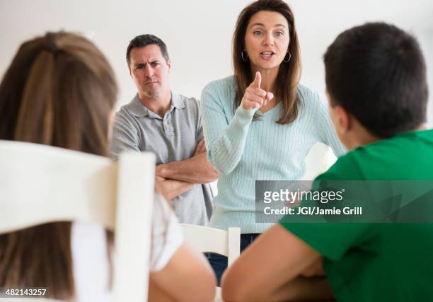 caucasian parents scolding children - angry kid stock pictures, royalty-free photos & images