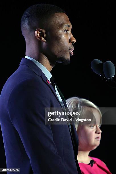 Player Damian Lillard and actress Lauren Potter speak at the opening ceremony of the Special Olympics World Games Los Angeles 2015 at the Los Angeles...