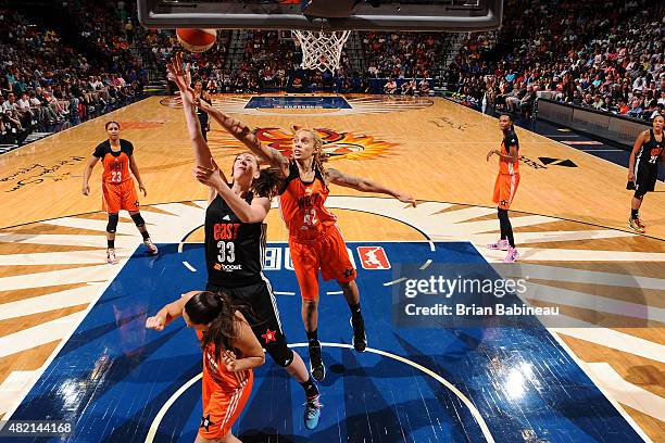 Emma Meesseman of the Eastern Conference All Stars shoots against the Western Conference All Stars during the Boost Mobile WNBA All-Star 2015 Game at...