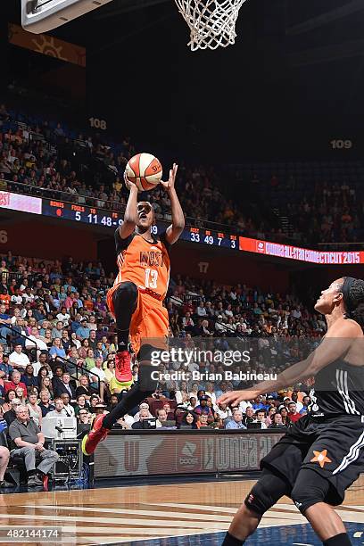 Lindsey Whalen of the Western Conference All Stars shoots against the Eastern Conference All Stars during the Boost Mobile WNBA All-Star 2015 Game at...