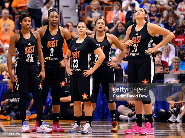 Angel McCoughtry, Kelsey Bone, Shoni Schimmel, Marissa Coleman, and Stefanie Dolson of the Eastern Conference All Stars stand on the court during the...