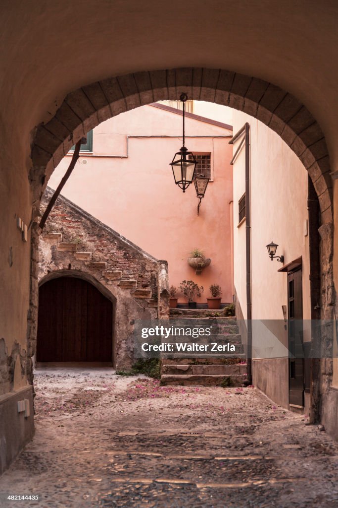 Stone archway to courtyard and steps