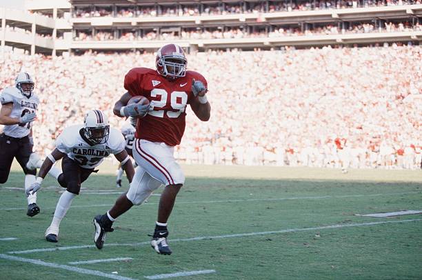 Ahmaad Galloway of the Alabama Crimson Tide runs with the ball against the South Carolina Gamecocks on September 30, 2000.