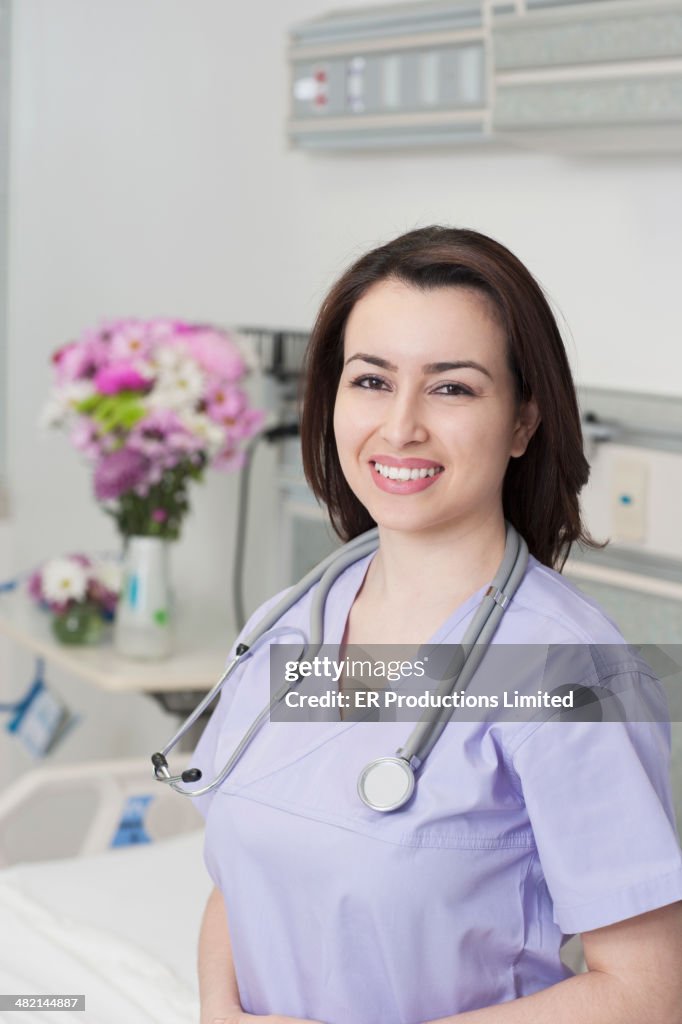 Nurse smiling in hospital