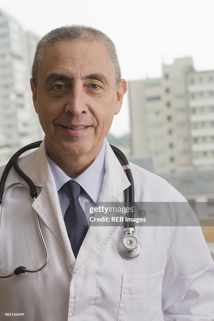 Close up portrait of Hispanic doctor