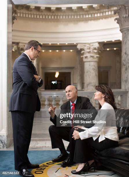 caucasian politicians talking in government building - the dome 55 stock pictures, royalty-free photos & images