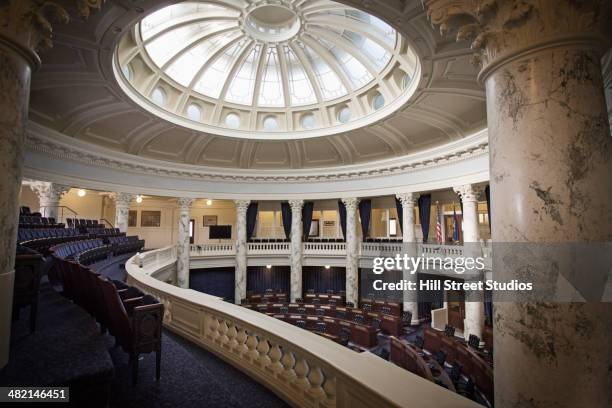 empty seats in government chamber - government building stockfoto's en -beelden