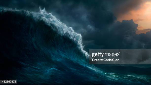 waves crashing on stormy sea - tormenta foto e immagini stock