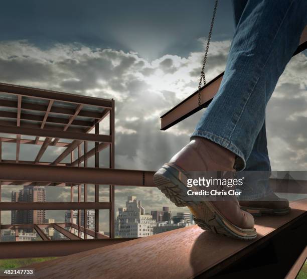 close up of construction worker on infrastructure - metallic shoe fotografías e imágenes de stock