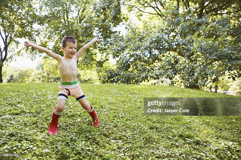 Caucasian boy playing in park