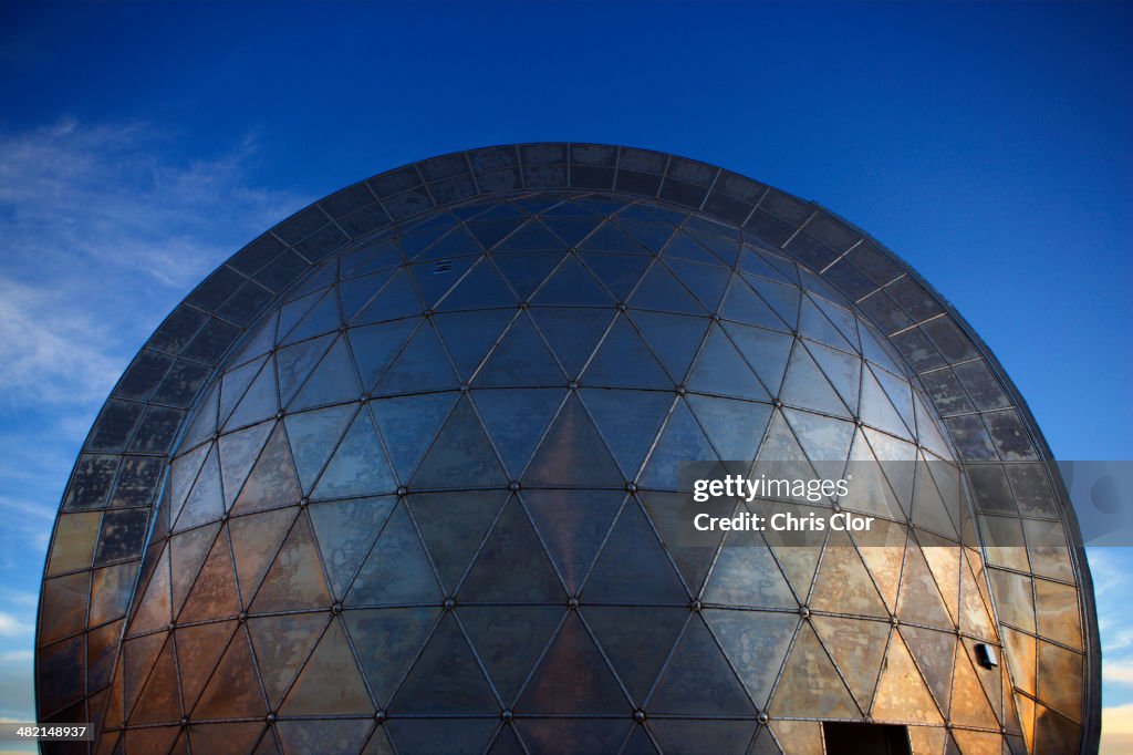 Metal observatory under blue sky