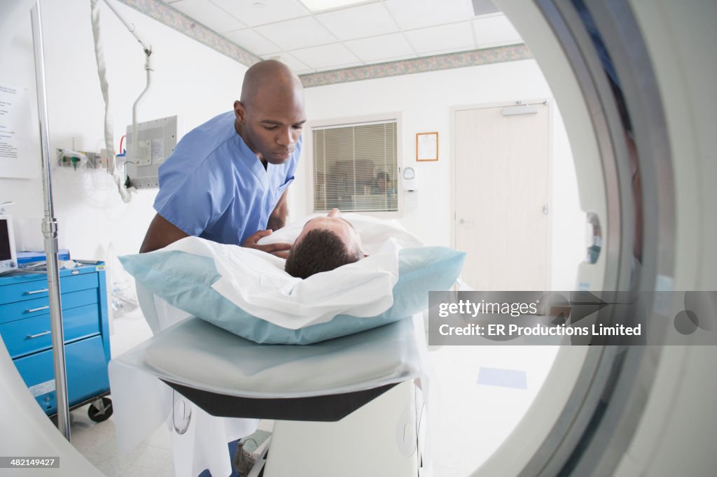 Nurse talking to patient before CAT scan