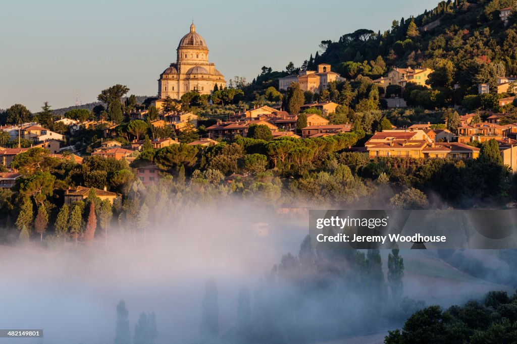 Morning fog and hill town, Todi, Umbria, Italy