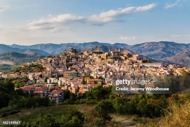 view of hillside town at sunset, castiglione della sicilia, catania, italy - catania sicily fotografías e imágenes de stock