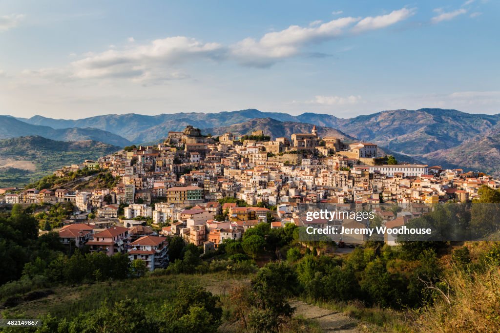 View of hillside town at sunset, Castiglione della Sicilia, Catania, Italy