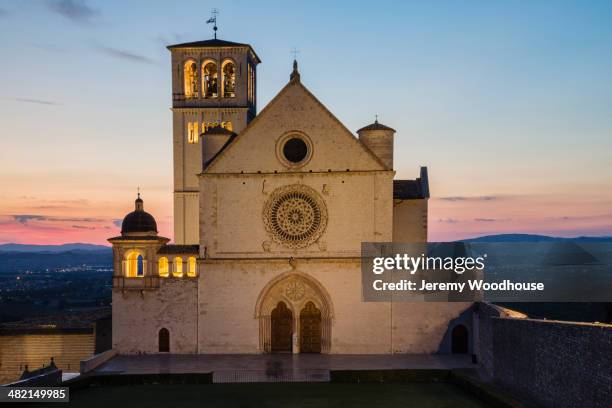 basilica di san francesco d'assisi at sunset, assisi, umbria, italy - assisi stock pictures, royalty-free photos & images