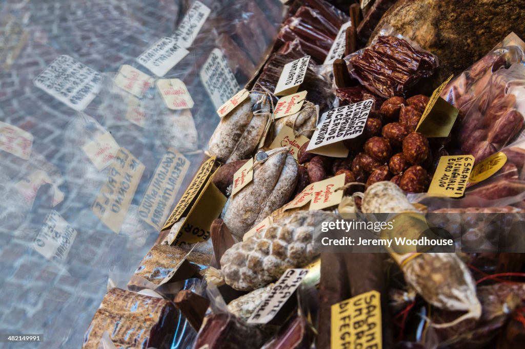 Dried meats on display at market, Orvieto, Umbria, Italy
