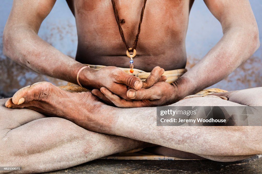 Close up of Sadhu in lotus position