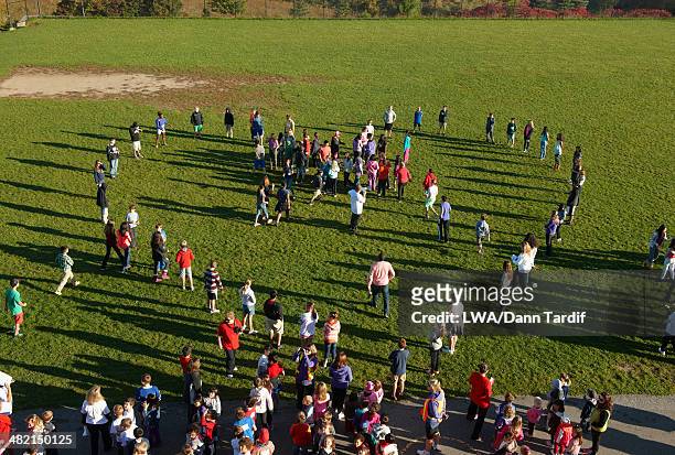 people forming heart-shape in park - native korean stock pictures, royalty-free photos & images