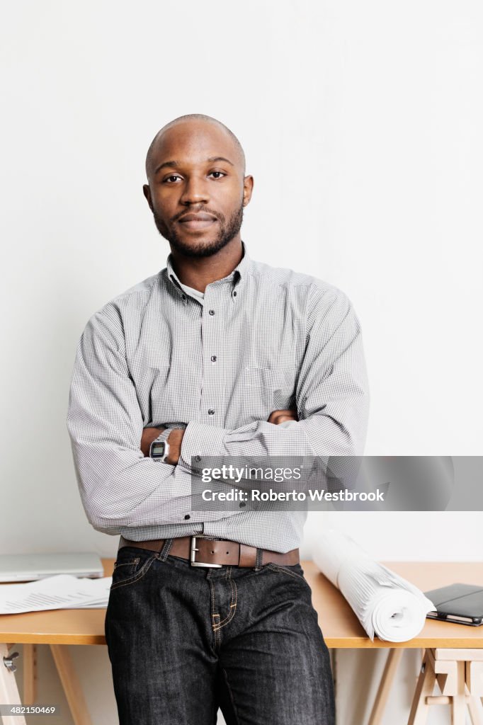 Portrait of confident Black architect in office