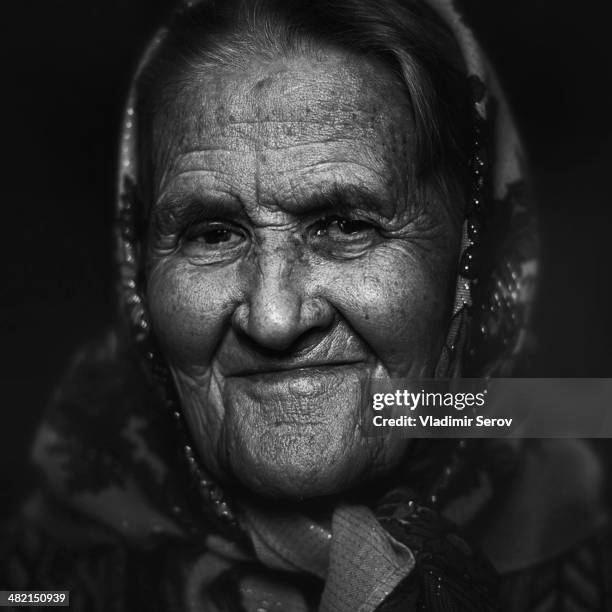 close up of senior caucasian woman's face - foulard foto e immagini stock