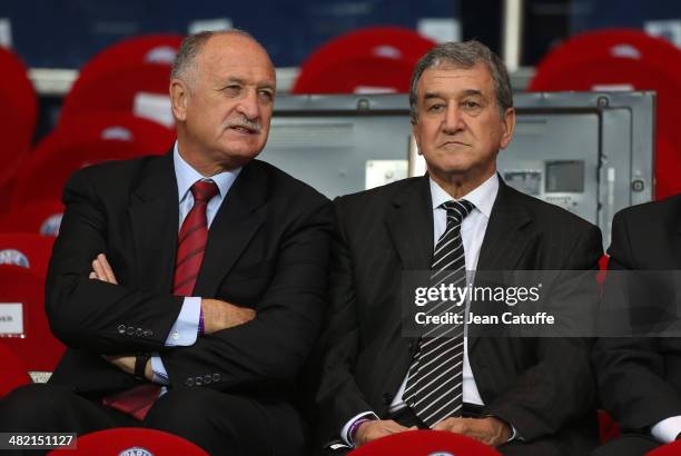 Coach of Brazil Luiz Felipe Scolari and his assistant coach Carlos Alberto Parreira attend the UEFA Champions League quarter final match between...