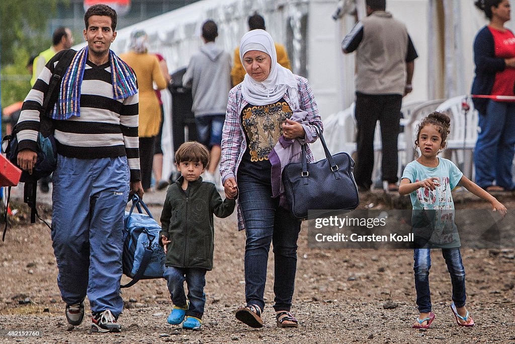 Refugees Arrive In Dresden Amidst Protests